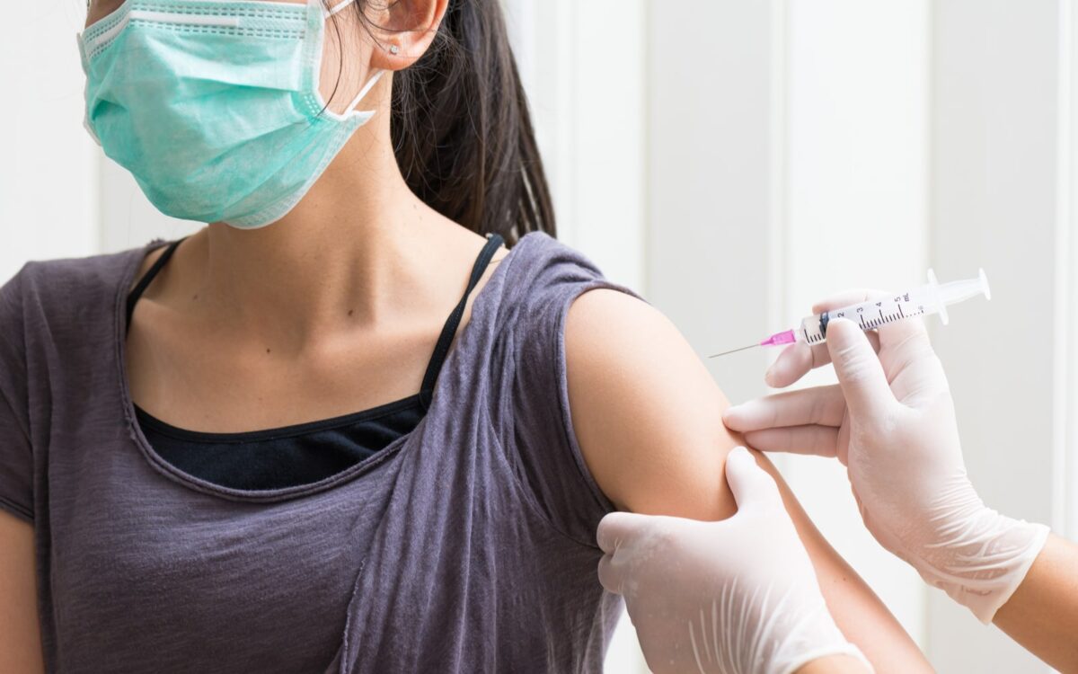 Woman Getting Shingles Vaccintation